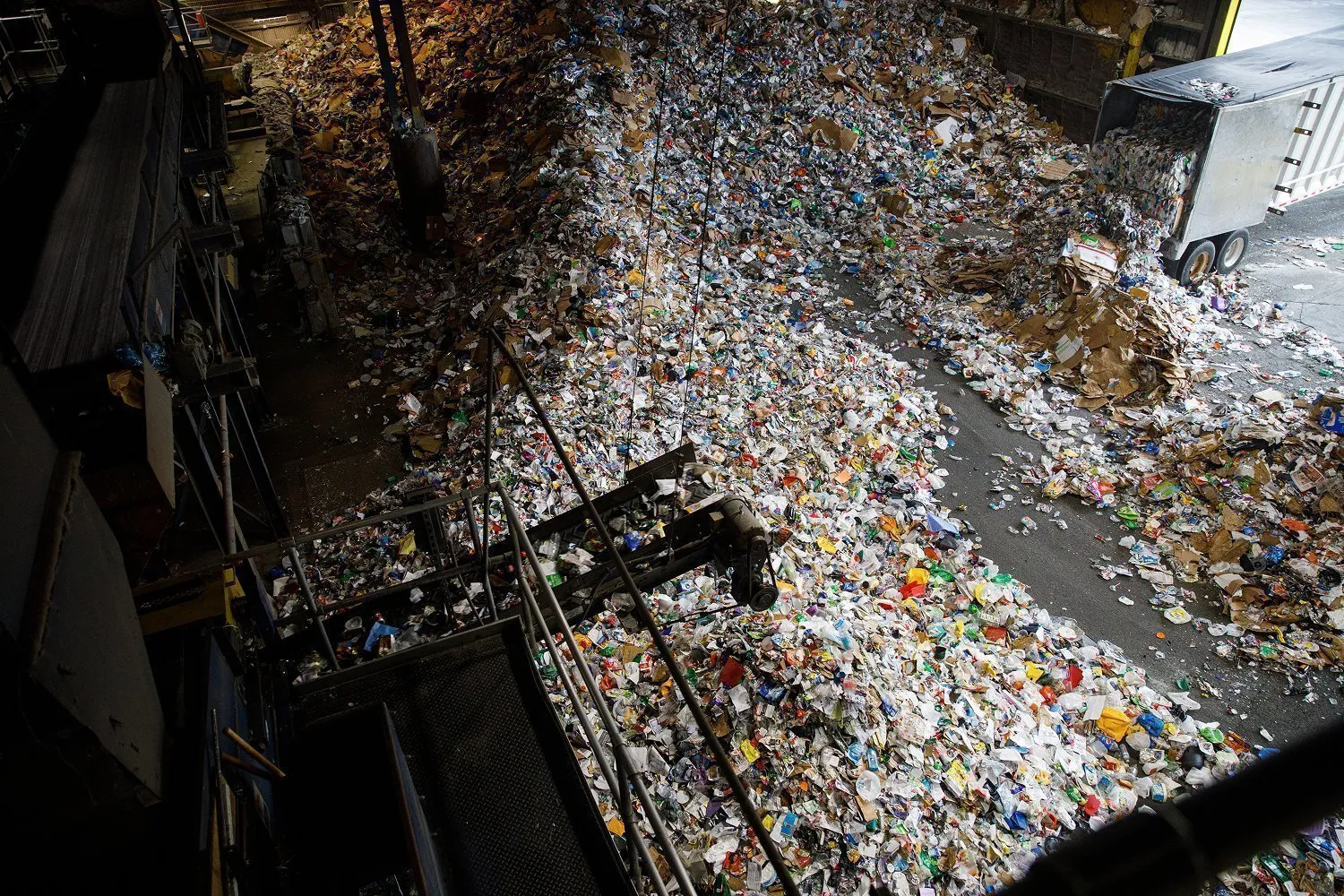 Recycled products on the floor at a recycle facility.