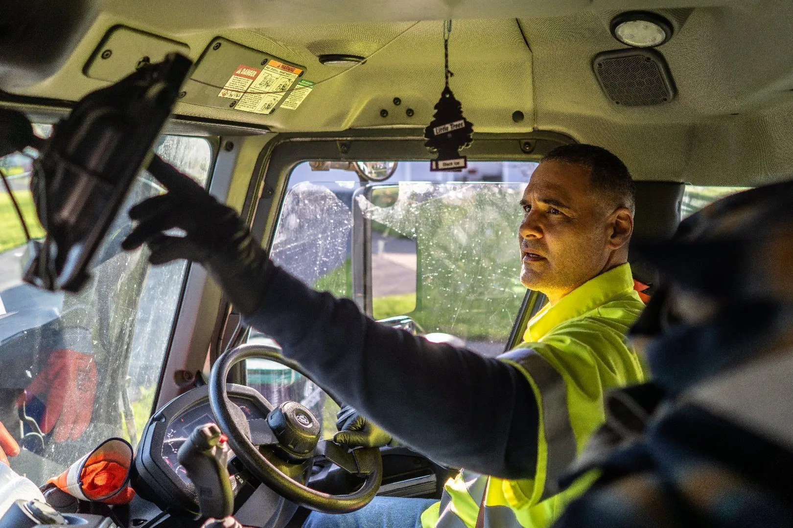 A Casella worker in a waste truck