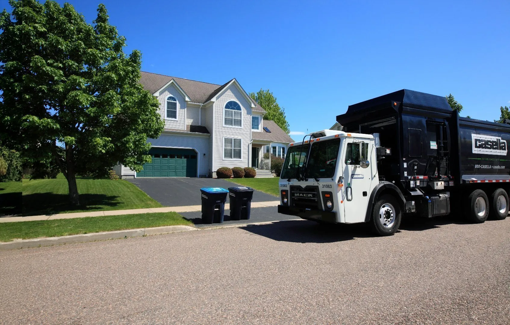 Residential waste collection service truck