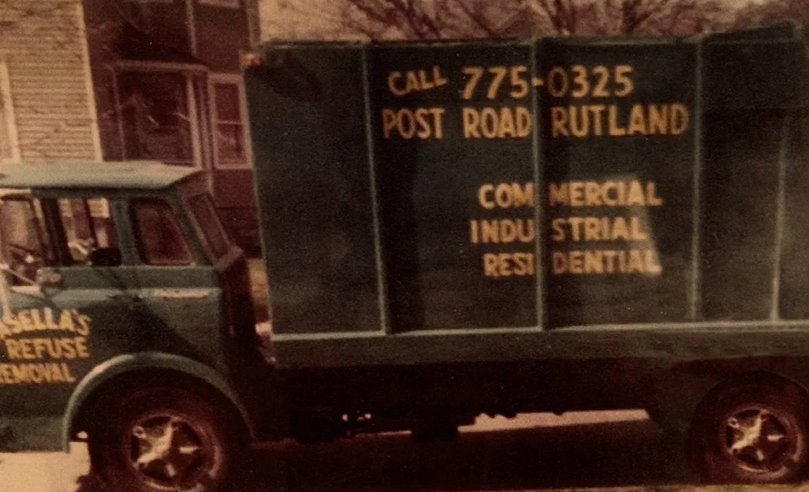 Historic Casella’s Refuse Removal truck displaying contact information and service offerings for commercial, industrial, and residential waste removal in Rutland, Vermont.